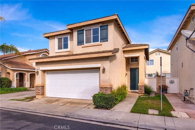 view of front of property with a garage