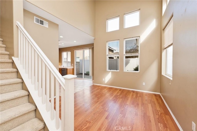 foyer with light wood-type flooring