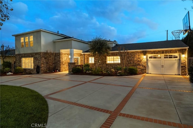 view of front of property featuring a garage