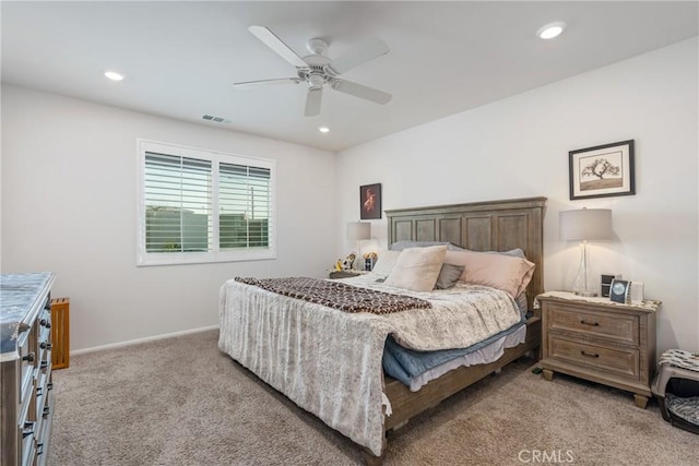 carpeted bedroom featuring ceiling fan