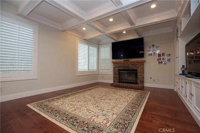 living room featuring beamed ceiling, coffered ceiling, a fireplace, and dark hardwood / wood-style floors