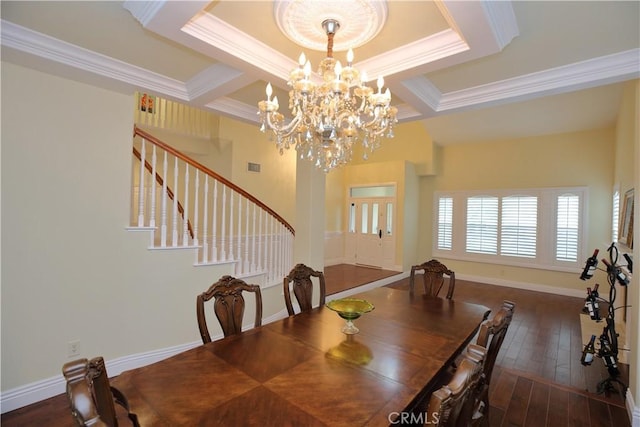 dining room featuring crown molding, dark hardwood / wood-style floors, and an inviting chandelier