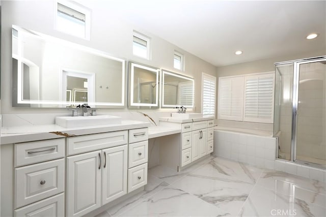 bathroom with vanity and an enclosed shower