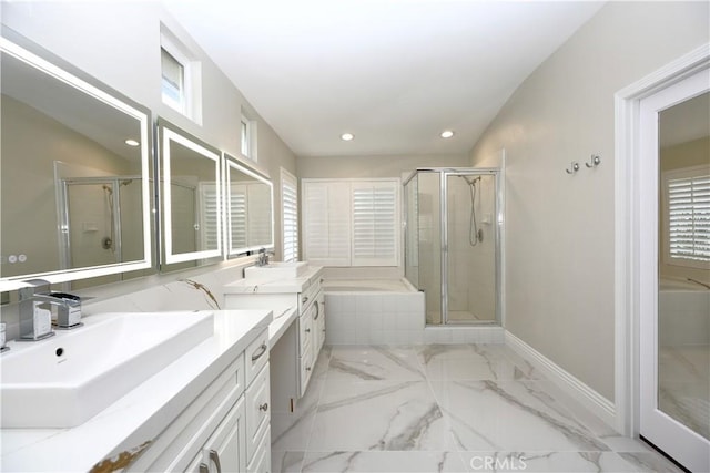 bathroom with vanity and an enclosed shower