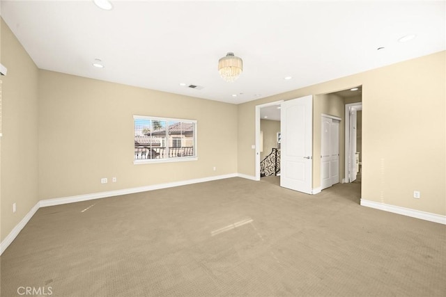 unfurnished bedroom with light carpet