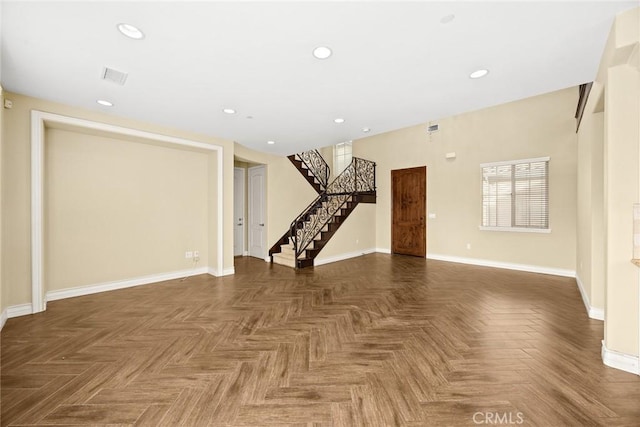 empty room with dark parquet floors