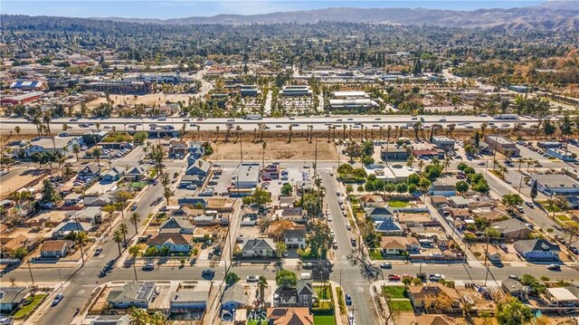 drone / aerial view featuring a mountain view