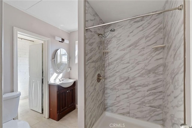 bathroom with vanity, toilet, and a shower stall