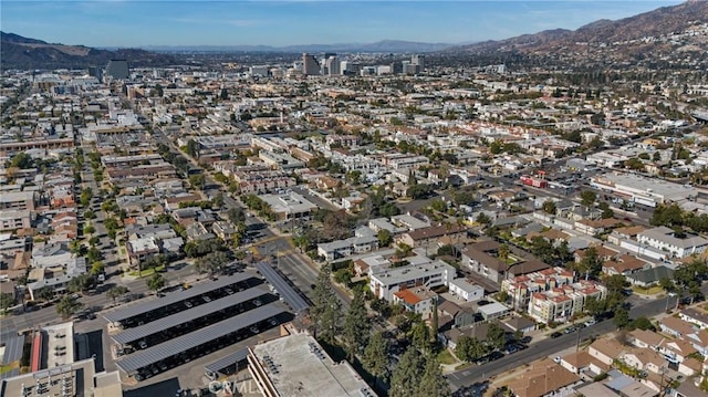 drone / aerial view featuring a mountain view