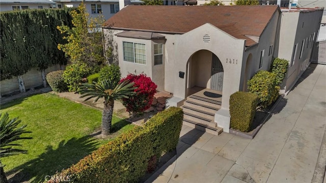 view of front of home with a front yard