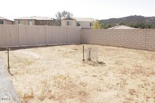 view of yard with a mountain view