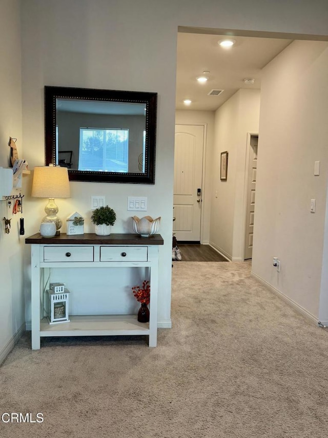 unfurnished living room with carpet