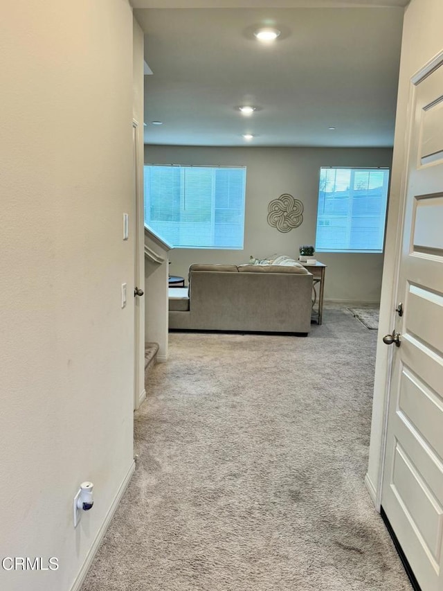 unfurnished bedroom featuring light colored carpet