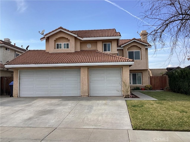 view of front of home with a garage and a front yard