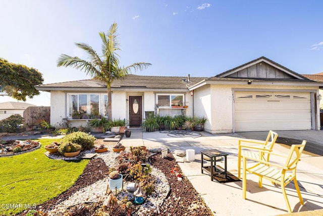 ranch-style home featuring a garage