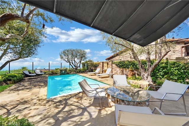 view of pool with a patio