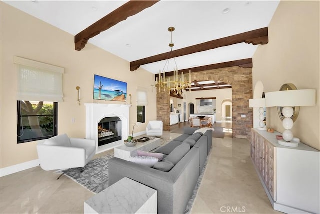 living room with lofted ceiling with beams