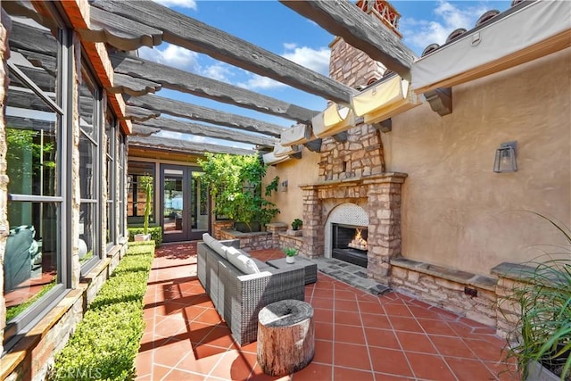 view of patio with a pergola, french doors, and an outdoor stone fireplace