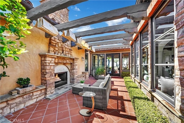 view of patio / terrace with an outdoor stone fireplace