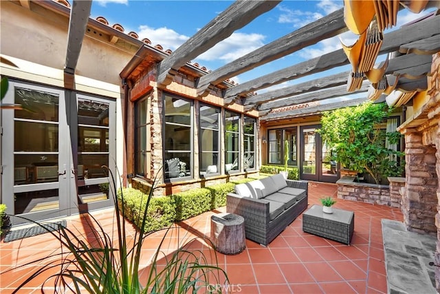 view of patio featuring a pergola and french doors