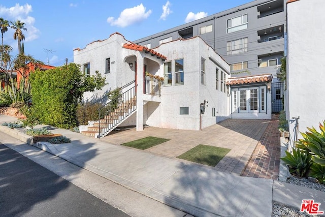 view of front of house with a patio area