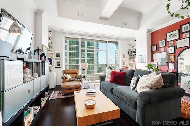 living room with crown molding and dark hardwood / wood-style flooring