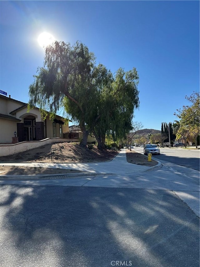 1310 Parsley Ln, Corona, CA 92879 - view of asphalt street with sidewalks and curbs
