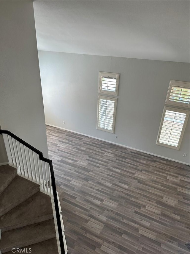 1310 Parsley Ln, Corona, CA 92879 - stairs with wood finished floors and healthy amount of natural light