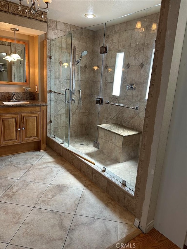 1310 Parsley Ln, Corona, CA 92879 - bathroom featuring vanity, a stall shower, and tile patterned flooring