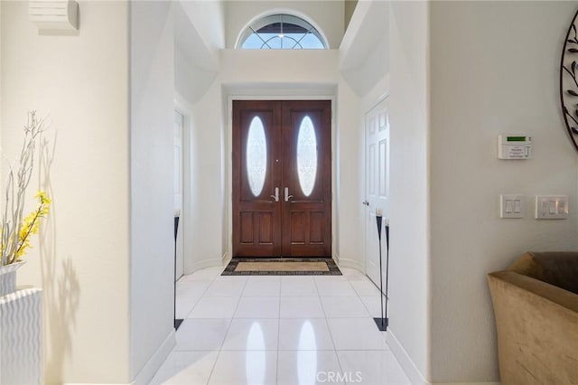 foyer with light tile patterned floors