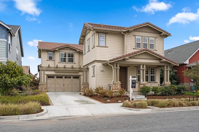 view of front of property with a garage