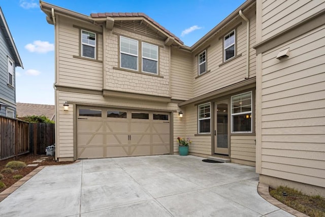 view of front of home with a garage