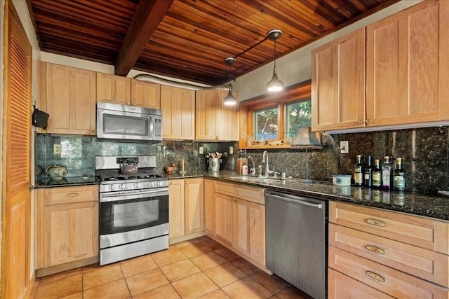 kitchen featuring pendant lighting, sink, stainless steel appliances, beamed ceiling, and light brown cabinets