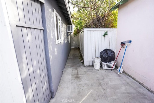 view of side of home featuring a patio area