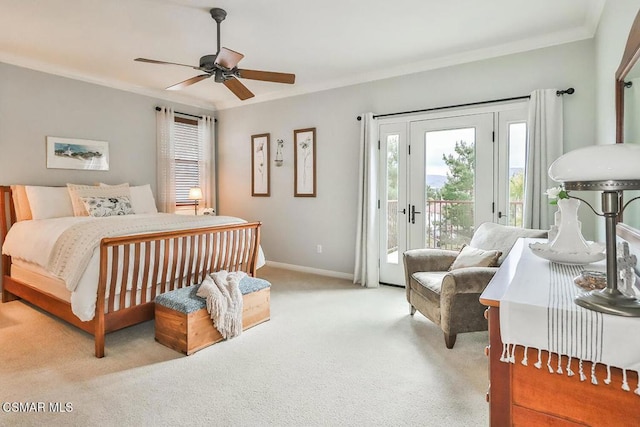 carpeted bedroom featuring crown molding, access to outside, and ceiling fan