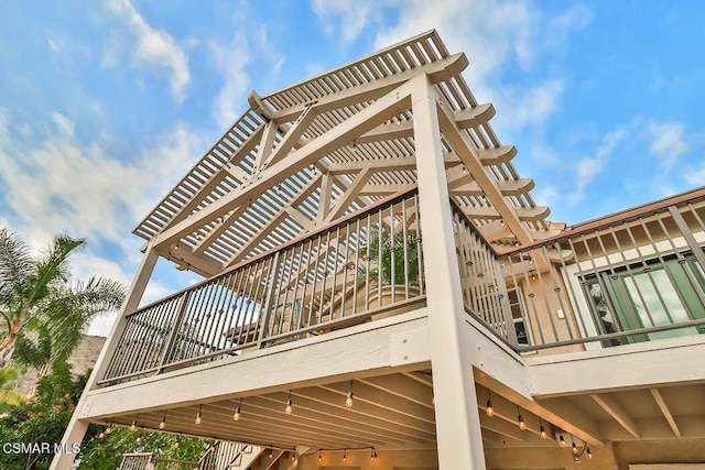 wooden terrace with a pergola