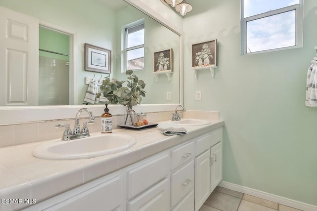 bathroom featuring tile patterned floors and vanity