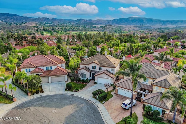 drone / aerial view featuring a mountain view