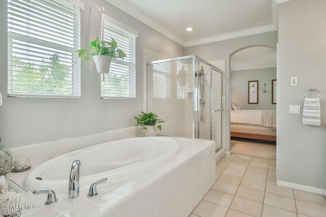 bathroom featuring tile patterned flooring, crown molding, and independent shower and bath