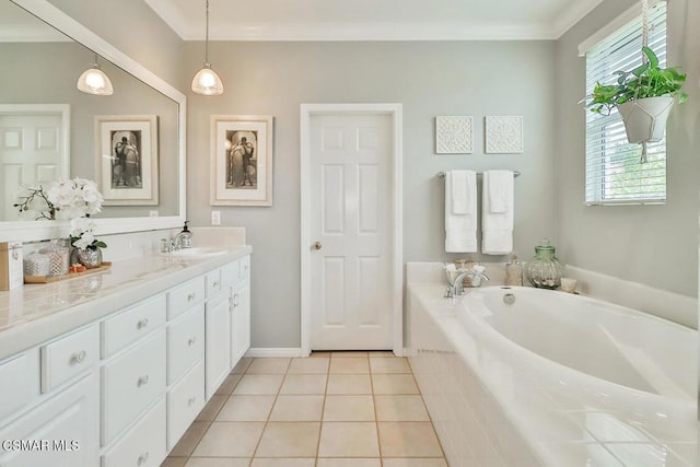 bathroom with crown molding, vanity, tiled bath, and tile patterned flooring