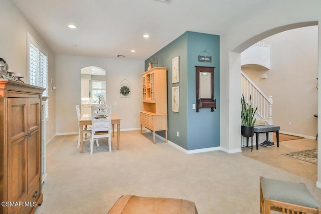 dining area with light carpet