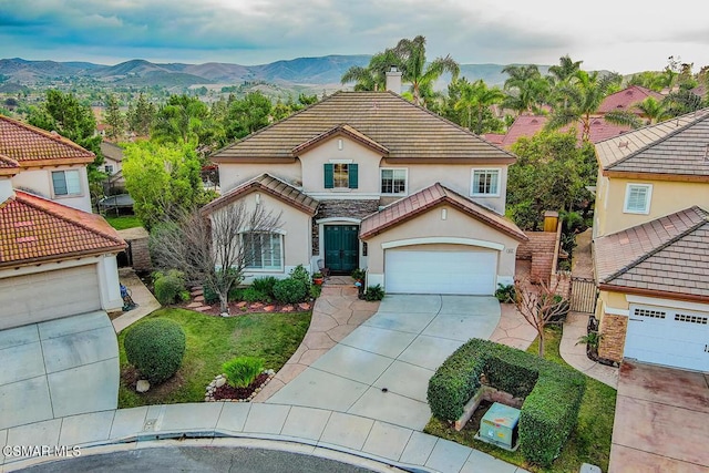 view of front of home with a mountain view