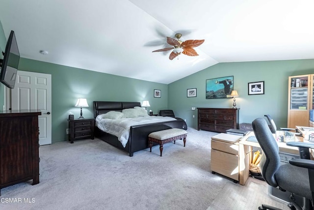 bedroom featuring ceiling fan, lofted ceiling, and light carpet