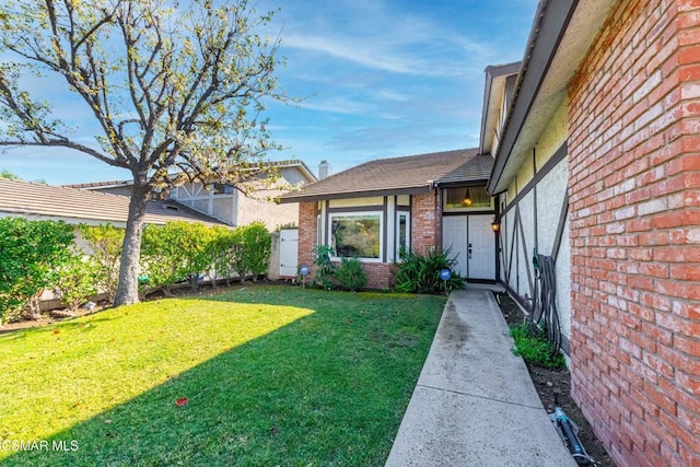 exterior space featuring a lawn