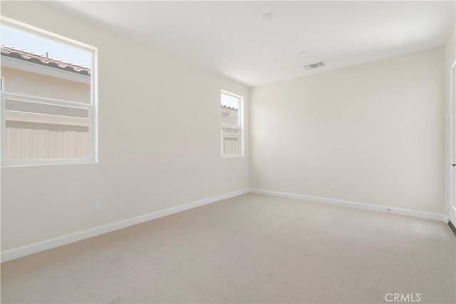 view of carpeted spare room