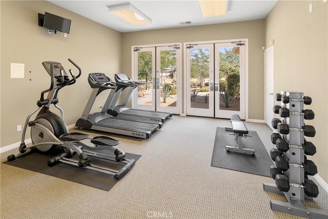 workout room featuring carpet