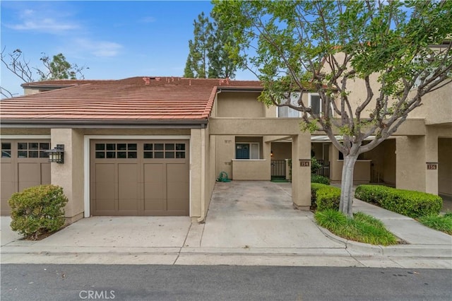 townhome / multi-family property featuring a garage