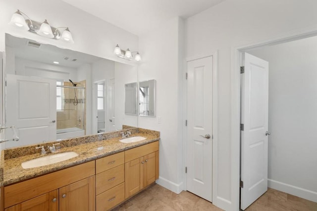 bathroom with vanity and tile patterned flooring