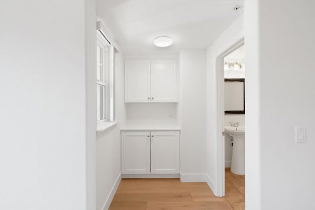 hall featuring light hardwood / wood-style floors