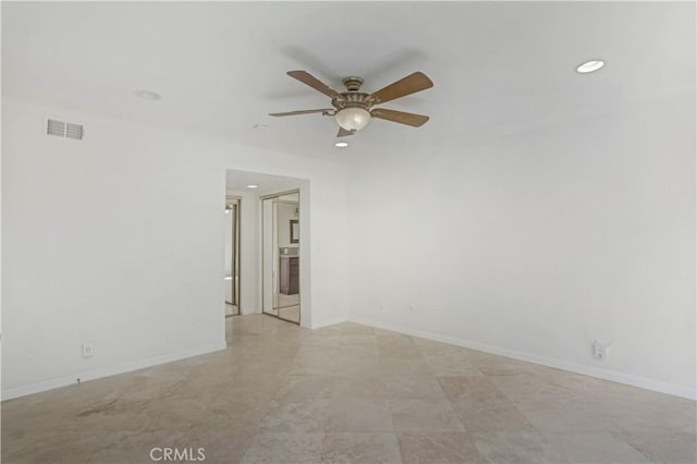 unfurnished room featuring recessed lighting, visible vents, and baseboards